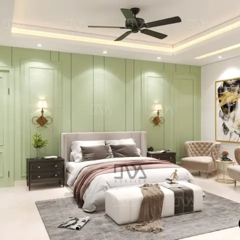 Sage-green moulded panel wall behind a pale upholstered bed, with scrolled brass sconces, black bedside chests