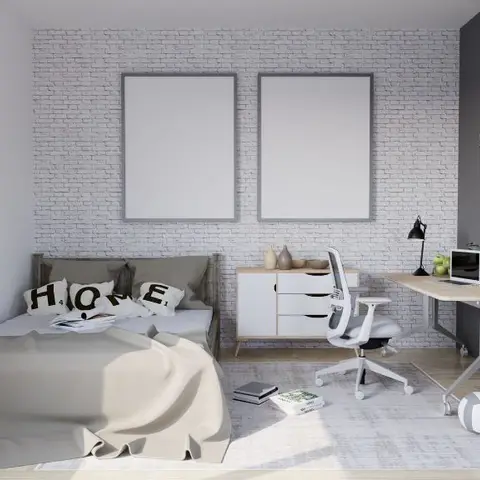 Single bed against a white brick-effect wallpaper wall with blank frame mockups, paired with a corner study desk on a dark grey accent wall bearing a cut-metal