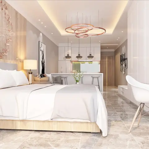 Studio-apartment render where a light oak platform bed with a grey padded headboard sits under a rose-gold butterfly spiral on the veneer wall