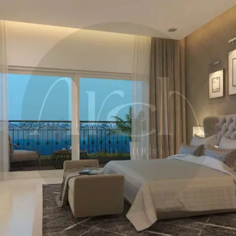 Studio-watermarked render of a taupe bedroom with a deep-buttoned wingback headboard, a triptych of framed prints on diamond-patterned wallpaper