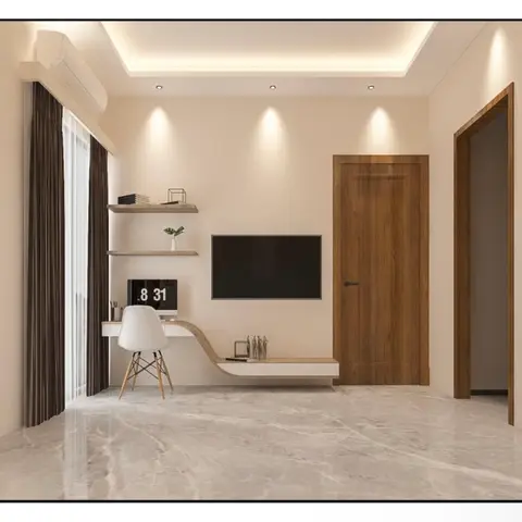 Study nook with a curved wood-and-white desk unit under floating shelves, a wall-mounted TV, cove-lit ceiling and glossy marble flooring.