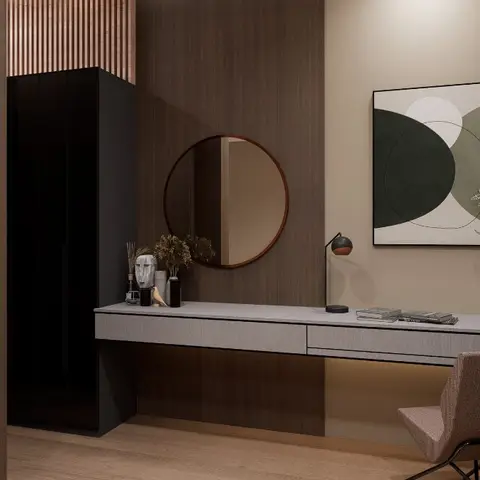 Study nook with a floating stone-top console under a round mirror, a black glass wardrobe, and an abstract green artwork on a taupe wall.