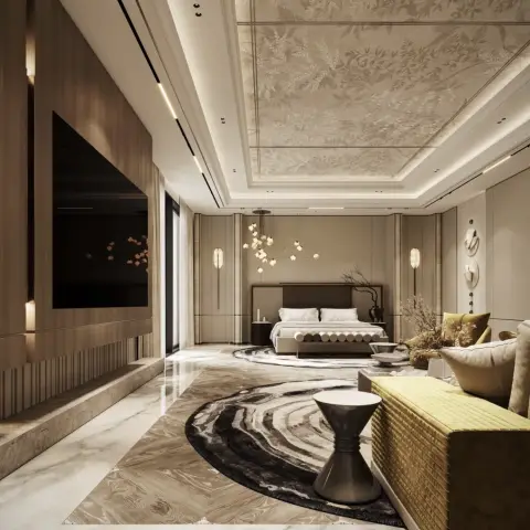 Suite-scale bedroom where a wood-veneer TV wall faces a low bed fronted by a bolster-cushion bench