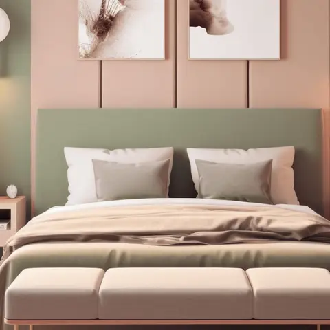 Symmetrical bedroom in peach and sage where a sage upholstered headboard sits against blush vertical wall panelling
