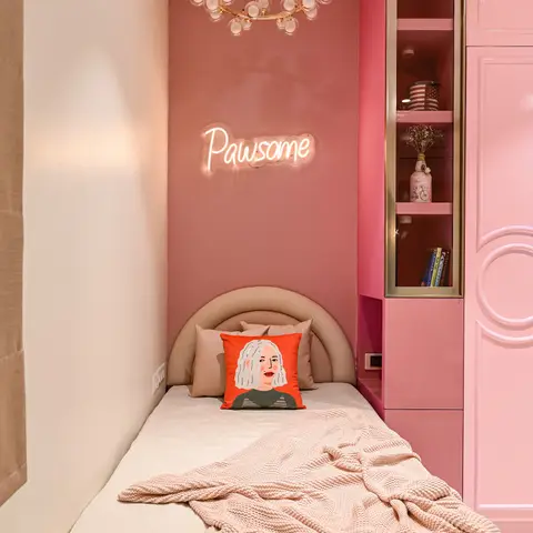 Teen bedroom with a deep pink accent wall, a glowing neon 'Pawsome' sign, a bubble-glass chandelier