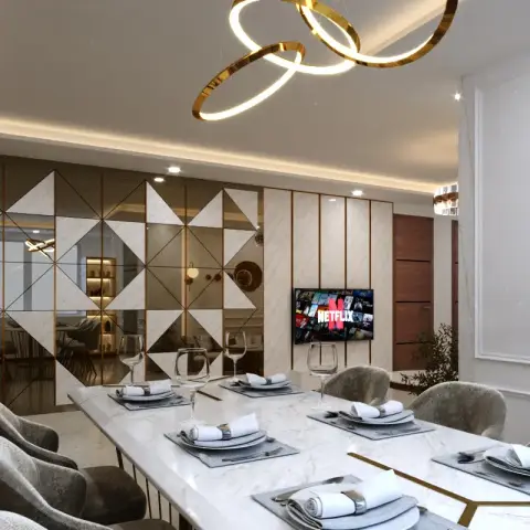 Ten-seat dining room where a harlequin wall of bronze mirror and white marble triangles in brass reveals reflects the room