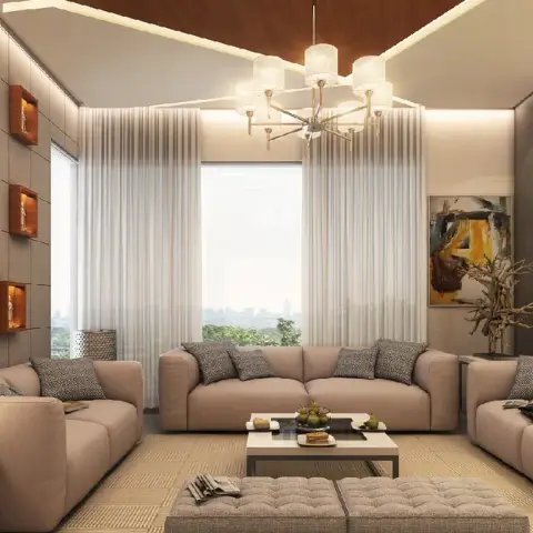 Three beige sofas box in a tufted ottoman and a low black-and-white coffee table, facing a grid-panelled wall whose teak-lined niches are each backlit around a