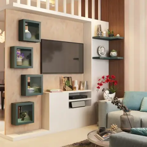 TV unit built into a half-height partition between dining and living, four teal shadow-box niches stepped down its textured beige face
