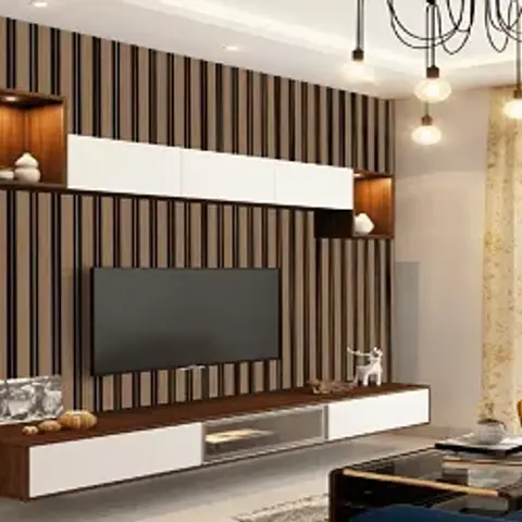 TV unit wall with black-and-walnut vertical fluted panelling and a cluster of exposed-bulb pendant lights above a mustard yellow accent chair.