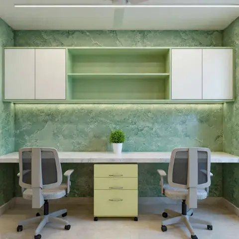 Two-seat home study with a built-in marble-top desk flanked by twin office chairs