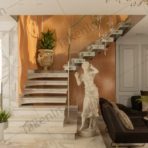 Villa stair hall in white-veined marble: cantilevered treads with a glass balustrade and brass-topped handrail against a copper fluted feature wall
