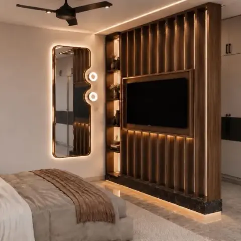Walnut fluted TV panel sitting on a black marble plinth with LED-lit niche shelves beside it