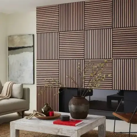 Walnut slats set in alternating horizontal and vertical squares make a checkerboard feature wall above a low black hearth unit